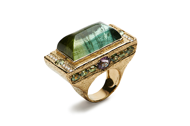 Briscoe’s 18-karat yellow gold and bi-color tourmaline ring features faceted demantoid garnet and spinel ($36,000)