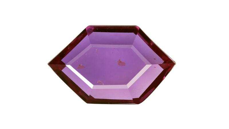 Navneet Gems and Minerals portrait-cut ruby