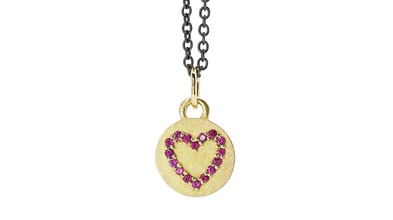 Alison Nagasue “Magic Heart Disc Necklace” with rubies in 18-karat gold on a blackened silver chain